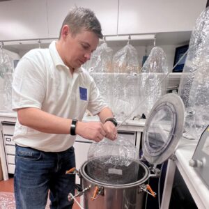 Lab Operator, Stephen, dilutes an odour sample using a vacuum chamber, at the Silsoe Odours olfactometry laboratory.